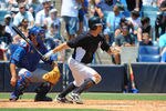 TAMPA, FL - APRIL 04: Outfielder Brett Gardner #11 of the New York Yankees bats against the New York Mets in a spring training game April 4, 2012  at George M. Steinbrenner Field in Tampa, Florida. (Photo by Al Messerschmidt/Getty Images)