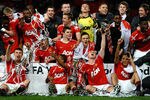 MANCHESTER, ENGLAND - MAY 23:  The Manchester United Team celebrate victory in the FA Youth Cup Final 2nd Leg match between Manchester United and Sheffield United at Old Trafford on May 23, 2011 in Manchester, England.  (Photo by Laurence Griffiths/Getty Images)