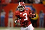 NEW ORLEANS, LA - JANUARY 09:  Trent Richardson #3 of the Alabama Crimson Tide runs with the ball against the Louisiana State University Tigers during the 2012 Allstate BCS National Championship Game at Mercedes-Benz Superdome on January 9, 2012 in New Orleans, Louisiana.  (Photo by Chris Graythen/Getty Images)