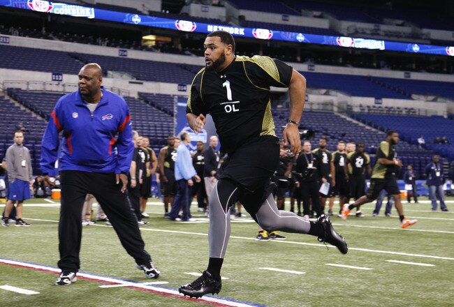 INDIANAPOLIS, IN - FEBRUARY 25: Offensive lineman Mike Adams of Ohio State participates in a drill during the 2012 NFL Combine at Lucas Oil Stadium on February 25, 2012 in Indianapolis, Indiana. (Photo by Joe Robbins/Getty Images)