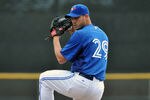 DUNEDIN, FL - MARCH 10: Pitcher Dustin McGowan #29 of the Toronto Blue Jays starts against the Houston Astros March 10, 2012 at Florida Auto Exchange Stadium in Dunedin, Florida. The Jays defeated the Astros 5-2.  (Photo by Al Messerschmidt/Getty Images)