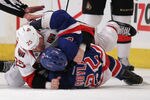 NEW YORK, NY - APRIL 14: Chris Neil #25 of the Ottawa Senators and Brian Boyle #22 of the New York Rangers fight during the first period in Game Two of the Eastern Conference Quarterfinals during the 2012 NHL Stanley Cup Playoffs at Madison Square Garden on April 14, 2012 in New York City.  The Senators defeated the Rangers 3-2 in overtime.(Photo by Bruce Bennett/Getty Images)