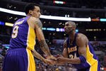 LOS ANGELES, CA - APRIL 04:  Kobe Bryant #24 and Matt Barnes #9 of the Los Angeles Lakers celebrate a defensive stop against the Los Angeles Clippers at Staples Center on April 4, 2012 in Los Angeles, California.  The Lakers won 113-108.  NOTE TO USER: User expressly acknowledges and agrees that, by downloading and or using this photograph, User is consenting to the terms and conditions of the Getty Images License Agreement.  (Photo by Harry How/Getty Images)