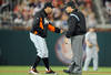WASHINGTON, DC - APRIL 20:  Manager Ozzie Guillen of the Miami Marlins argues a call with second base umpire Phil Cuzzi in the eighth inning against the Washington Nationals at Nationals Park on April 20, 2012 in Washington, DC.  (Photo by Greg Fiume/Getty Images)