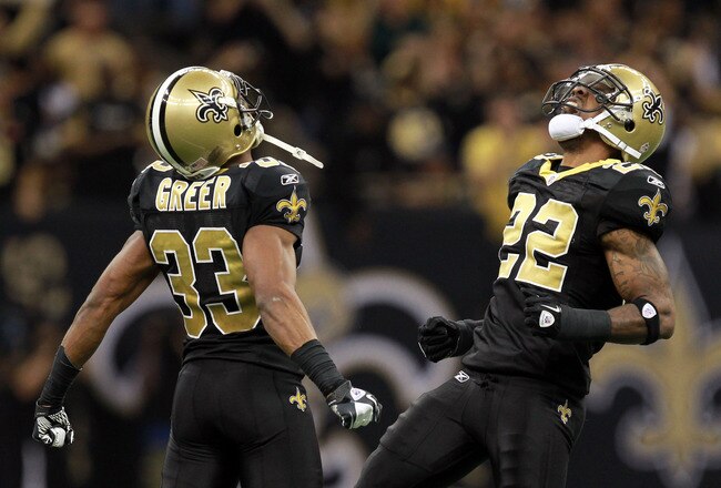 NEW ORLEANS, LA - JANUARY 07:  Jabari Greer #33 of the New Orleans Saints celebrates with teammate Tracy Porter #22 after an interception in the fourth quarter against the Detroit Lions during their 2012 NFC Wild Card Playoff game at Mercedes-Benz Superdome on January 7, 2012 in New Orleans, Louisiana.  (Photo by Ronald Martinez/Getty Images)