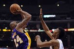 LOS ANGELES, CA - APRIL 04:  Kobe Bryant #24 of the Los Angeles Lakers shoots a jumper in front of Nick Young #11 of the Los Angeles Clippers at Staples Center on April 4, 2012 in Los Angeles, California.  NOTE TO USER: User expressly acknowledges and agrees that, by downloading and or using this photograph, User is consenting to the terms and conditions of the Getty Images License Agreement.  (Photo by Harry How/Getty Images)