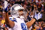 EAST RUTHERFORD, NJ - JANUARY 01:  Laurent Robinson #81 of the Dallas Cowboys celebrates after catching a pass for a touchdown in the third quarter against the New York Giants at MetLife Stadium on January 1, 2012 in East Rutherford, New Jersey.  (Photo by Jeff Zelevansky/Getty Images)