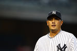 NEW YORK, NY - APRIL 16:  Freddy Garcia #36 of the New York Yankees reacts after giving up a home run against Justin Morneau #33 of the Minnesota Twins  during their game on April 16, 2012 at Yankee Stadium in the Bronx borough of New York City.  (Photo by Al Bello/Getty Images)
