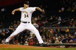 PITTSBURGH, PA - APRIL 21:  A.J. Burnett #34 of the Pittsburgh Pirates pitches in his first game for the Pirates against the St Louis Cardinals during the game on April 21, 2012 at PNC Park in Pittsburgh, Pennsylvania.  (Photo by Jared Wickerham/Getty Images)