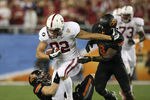GLENDALE, AZ - JANUARY 02: Coby Fleener #82 of the Stanford Cardinal runs for yards after the catch against the Oklahoma State Cowboys during the Tostitos Fiesta Bowl on January 2, 2012 at University of Phoenix Stadium in Glendale, Arizona.  (Photo by Donald Miralle/Getty Images)