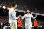 BARCELONA, SPAIN - APRIL 21:  Cristiano Ronaldo (L) of Real Madrid CF celebrates with Mesut Ozil after scoring his team's 2nd goal during the La Liga match between FC Barcelona and Real Madrid CF at Camp Nou on April 21, 2012 in Barcelona, Spain.  (Photo by Denis Doyle/Getty Images)