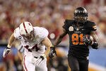 GLENDALE, AZ - JANUARY 02:  Justin Blackmon #81 of the Oklahoma State Cowboys catches a 67-yard touchdown reception in the second quarter against Chase Thomas #44 of the Stanford Cardina during the Tostitos Fiesta Bowl on January 2, 2012 at University of Phoenix Stadium in Glendale, Arizona.(Photo by Christian Petersen/Getty Images)