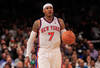 NEW YORK, NY - APRIL 17:  Carmelo Anthony #7 of the New York Knicks dribbles the ball against the Boston Celtics at Madison Square Garden on April 17, 2012 in New York City. NOTE TO USER: User expressly acknowledges and agrees that, by downloading and/or using this Photograph, user is consenting to the terms and conditions of the Getty Images License Agreement.  (Photo by Chris Trotman/Getty Images)