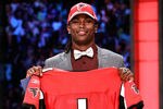 NEW YORK, NY - APRIL 28:  Julio Jones, #6 overall pick by the Atlanta Falcons, holds up a jersey on stage during the 2011 NFL Draft at Radio City Music Hall on April 28, 2011 in New York City.  (Photo by Chris Trotman/Getty Images)