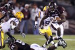 STARKVILLE, MS - SEPTEMBER 15:  Running back Vick Ballard #28 of the Mississippi State Bulldogs tries to hurdle offensive linesman Quentin Saulsberry #55 of the Mississippi State Bulldogs as linebacker Karnell Hatcher #37 of the LSU Tigers closes in for the tackle in the second quarter on September 15, 2011 at Davis Wade stadium in Starkville, Mississippi. (Photo by Butch Dill/Getty Images)