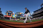 NEW YORK, NY - APRIL 05:  Freddie Freeman #5 of the Atlanta Braves walks back to the dugout at the end of the top of the eighth inning against the New York Mets during their Opening Day Game at Citi Field on April 5, 2012 in New York City.  (Photo by Nick Laham/Getty Images)