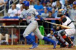 MIAMI, FL - APRIL 17:  Alfonso Soriano #12 of the Chicago Cubs hits during a game against the Miami Marlins at Marlins Park on April 17, 2012 in Miami, Florida.  (Photo by Mike Ehrmann/Getty Images)