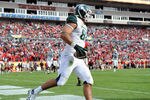 TMAPA, FL - JANUARY 02: Tight end Brian Linthicum #88 of the  Michigan State Spartans runs fron the end zone after a touchdown catch against the Georgia Bulldogs in the Outback Bowl January 2, 2012 at Raymond James Stadium, Tampa Florida. The Spartans won 33 - 30. (Photo by Al Messerschmidt/Getty Images)