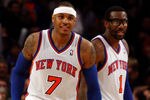 NEW YORK, NY - MARCH 20:  (L-R) Carmelo Anthony #7 and Amare Stoudemire #1 of the New York Knicks react on court in the second half against the Toronto Raptors at Madison Square Garden on March 20, 2012 in New York City.  NOTE TO USER: User expressly acknowledges and agrees that, by downloading and or using this photograph, User is consenting to the terms and conditions of the Getty Images License Agreement.  (Photo by Chris Chambers/Getty Images)