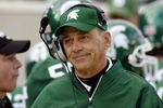 EAST LANSING, MI - OCTOBER 14:  John L. Smith, the head coach of the Michigan State Spartans, reacts after a second quater dropped pass against the Ohio State Buckeys on October 14, 2006 at Spartan Stadium in East Lansing, Michigan. Ohio State won the game 38-7.  (Photo by Gregory Shamus/Getty Images)