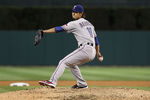 DETROIT, MI - APRIL 19:  Yu Darvish #11 of the Texas Rangers pitches in the seventh inning against Don Kelly #32 of the Detroit Tigers during the game at Comerica Park on April 19, 2012 in Detroit, Michigan. The Rangers defeated the Tigers 10-3. (Photo by Leon Halip/Getty Images)