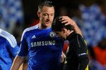 LONDON, ENGLAND - APRIL 18:  Lionel Messi of Barcelona is consoled by John Terry of Chelsea after the final whistle during the UEFA Champions League Semi Final first leg match between Chelsea and Barcelona at Stamford Bridge on April 18, 2012 in London, England.  (Photo by Michael Regan/Getty Images)