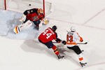 SUNRISE, FL - JANUARY 24: Jakub Voracek #93 of the Philadelphia Flyers scores a goal past goaltender Scott Clemmensen #30 of the Florida Panthers on January 24, 2012 at the BankAtlantic Center in Sunrise, Florida. The Flyers defeated the Panthers 3-2 in a shoot out. (Photo by Joel Auerbach/Getty Images)