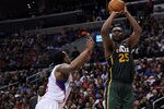 LOS ANGELES, CA - MARCH 31:  Al Jefferson #25 of the Utah Jazz shoots a jumper in front of DeAndre Jordan #6 of the Los Angeles Clippers during a 105-96 Clipper win at Staples Center on March 31, 2012 in Los Angeles, California.  NOTE TO USER: User expressly acknowledges and agrees that, by downloading and or using this photograph, User is consenting to the terms and conditions of the Getty Images License Agreement.  (Photo by Harry How/Getty Images)