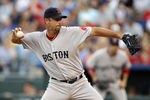 KANSAS CITY, MO - AUGUST 20:  Starting pitcher Tim Wakefield #49 of the Boston Red Sox throws in the second inning during a game against the Kansas City Royals at Kauffman Stadium on August 20, 2011 in Kansas City, Missouri. (Photo by Ed Zurga/Getty Images)