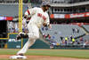 CLEVELAND, OH - APRIL 8: Catcher Carlos Santana #41 of the Cleveland Indians rounds third base after hitting a solo home run during the second inning against the Toronto Blue Jays at Progressive Field on April 8, 2012 in Cleveland, Ohio. Cleveland defeated the Blue Jays 4-3. (Photo by Jason Miller/Getty Images)