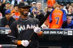 NEW YORK, NY - APRIL 24:  Jose Reyes #7 of the Miami Marlins looks at a tribute video of himself when he played for the New York Mets before his first game back to Citi Field against the Mets on April 24, 2012 at Citi Field in the Flushing neighborhood of the Queens borough of New York City.  (Photo by Al Bello/Getty Images)