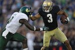 SOUTH BEND, IN - SEPTEMBER 03: Michael Floyd #3 of the Notre Dame Fighting Irish fights off  Jon Lejiste #8 of the University of South Florida Bulls at Notre Dame Stadium on September 3, 2011 in South Bend, Indiana. (Photo by Jonathan Daniel/Getty Images)