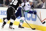 LOS ANGELES, CA - APRIL 18:  Ryan Kesler #17 of the Vancouver Canucks is checked to the boards by Jarret Stoll #28 of the Los Angeles Kings during the second period at Staples Center on April 18, 2012 in Los Angeles, California.  (Photo by Harry How/Getty Images)