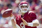 FAYETTEVILLE, AR - APRIL 21:   Quarterback Tyler Wilson #8 of the Arkansas Razorbacks Red Team throws a pass during the Spring Game at Donald W. Reynolds Stadium on April 21, 2012 in Fayetteville, Arkansas.  (Photo by Wesley Hitt/Getty Images)