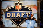NEW YORK - APRIL 22:  Derrick Morgan from the Georgia Tech Yellow Jackets holds up a Tennessee Titans jersey after the Titans selected Morgan number 16 overall during the first round of the 2010 NFL Draft at Radio City Music Hall on April 22, 2010 in New York City.  (Photo by Jeff Zelevansky/Getty Images)