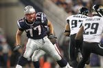 FOXBORO, MA - AUGUST 11:  Nate Solder #77 of the New England Patriots battles defends against the Jacksonville Jaguars during a preseason game at Gillette Stadium on August 11, 2011 in Foxboro, Massachusetts. (Photo by Jim Rogash/Getty Images)