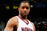 ATLANTA, GA - DECEMBER 28:  Tracy McGrady #1 of the Atlanta Hawks walks on the court against the Washington Wizards at Philips Arena on December 28, 2011 in Atlanta, Georgia.  NOTE TO USER: User expressly acknowledges and agrees that, by downloading and or using this photograph, User is consenting to the terms and conditions of the Getty Images License Agreement.  (Photo by Kevin C. Cox/Getty Images)