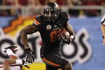 GLENDALE, AZ - JANUARY 02:  Justin Blackmon #81 of the Oklahoma State Cowboys catches a 67-yard touchdown reception in the second quarter against Terrence Brown #6 of the Stanford Cardinal during the Tostitos Fiesta Bowl on January 2, 2012 at University of Phoenix Stadium in Glendale, Arizona.  (Photo by Christian Petersen/Getty Images)