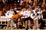 AUSTIN, TX - NOVEMBER 25:  Texas A&M wide receiver Jeff Fuller #8 misses a catch as University of Texas cornerback Aaron Williams #4 defends during the first half at Darrell K. Royal-Texas Memorial Stadium on November 25, 2010 in Austin, Texas. (Photo by Darren Carroll/Getty Images)