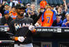 NEW YORK, NY - APRIL 24:  Jose Reyes #7 of the Miami Marlins looks at a tribute video of himself when he played for the New York Mets before his first game back to Citi Field against the Mets on April 24, 2012 at Citi Field in the Flushing neighborhood of the Queens borough of New York City.  (Photo by Al Bello/Getty Images)