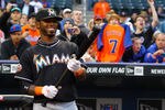NEW YORK, NY - APRIL 24:  Jose Reyes #7 of the Miami Marlins looks at a tribute video of himself when he played for the New York Mets before his first game back to Citi Field against the Mets on April 24, 2012 at Citi Field in the Flushing neighborhood of the Queens borough of New York City.  (Photo by Al Bello/Getty Images)