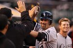 OAKLAND, CA - APRIL 23:  Paul Konerko #14 of the Chicago White Sox is congtratulated by teammates after he hit a home run in the fourth inning of their game against the Oakland Athletics at O.co Coliseum on April 23, 2012 in Oakland, California.  (Photo by Ezra Shaw/Getty Images)