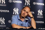 NEW YORK, NY - JULY 08:  General manager Brian Cashman of the New York Yankees speaks to the media after the game against the Tampa Bay Rays was postponed due to rain on July 8, 2011 at Yankee Stadium in the Bronx borough of New York City.  (Photo by Jim McIsaac/Getty Images)