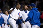 CHICAGO, IL - APRIL 24:   Alfonso Soriano #12 of the Chicago Cubs (L) celebrates with his teammates after hitting a game-winning RBI single scoring Tony Campana #1 during the 10th inning against the St. Louis Cardinals at Wrigley Field on April 24, 2012 in Chicago, Illinois. The Cubs defeated the Cardinals 3-2 in 10 innings.  (Photo by Brian Kersey/Getty Images)