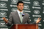 FLORHAM PARK, NJ - MARCH 26:  Quarterback Tim Tebow addresses the media as he is introduced as a New York Jet at the Atlantic Health Jets Training Center on March 26, 2012 in Florham Park, New Jersey. Tebow, traded from the Denver Broncos last week, will be the team's backup quarterback according to Jets head coach Rex Ryan. Tebow, the 2007 Heisman Trophy winner, started 11 games in 2011 for Denver and finished with a 7-4 record as a starter. He led the Broncos to a playoff overtime win against the Pittsburgh Steelers in the first round before eventually losing to the New England Patriots in the next round.  (Photo by Mike Stobe/Getty Images)
