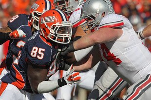 CHAMPAIGN, IL - OCTOBER 15: Whitney Mercilus #85 of the Illinois Fighting Illini rushes against Jack Mewhort #74 of the Ohio State Buckeyes at Memorial Stadium on October 15, 2011 in Champaign, Illinois. Ohio State defeated Illinois 17-7. (Photo by Jonathan Daniel/Getty Images)