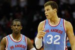 CHARLOTTE, NC - FEBRUARY 11:  Teammates Chris Paul #3 of the Los Angeles Clippers and Blake Griffin #32 walk down the court against the Charlotte Bobcats during their game at Time Warner Cable Arena on February 11, 2012 in Charlotte, North Carolina. NOTE TO USER: User expressly acknowledges and agrees that, by downloading and or using this photograph, User is consenting to the terms and conditions of the Getty Images License Agreement.  (Photo by Streeter Lecka/Getty Images)