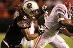COLUMBIA, SC - NOVEMBER 14:  Brandon James #25 of the Florida Gators runs with the ball away from Stephon Gilmore #5 of the South Carolina Gamecocks during their game at Williams-Brice Stadium on November 14, 2009 in Columbia, South Carolina.  (Photo by Streeter Lecka/Getty Images)