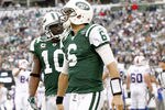 EAST RUTHERFORD, NJ - NOVEMBER 27:  Santonio Holmes #10 talks to   Mark Sanchez #6 of the New York Jets during their game against the Buffalo Bills at MetLife Stadium on November 27, 2011 in East Rutherford, New Jersey.  (Photo by Jeff Zelevansky/Getty Images)