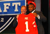NEW YORK, NY - APRIL 26:  Dontari Poe of Memphis holds up a jersey as he stands on stage with NFL Commissioner Roger Goodell after he was selected #11 overall by the Kansas City Chiefs in the first round of the 2012 NFL Draft at Radio City Music Hall on April 26, 2012 in New York City.  (Photo by Al Bello/Getty Images)